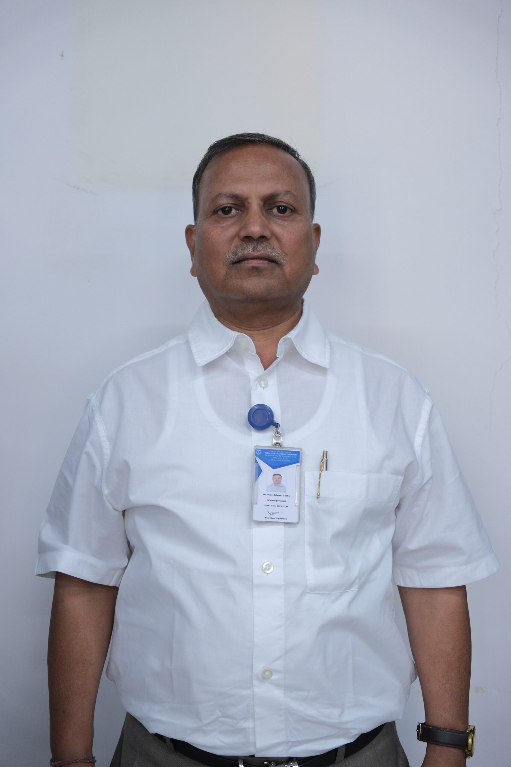 Dr. Vijay Tadke